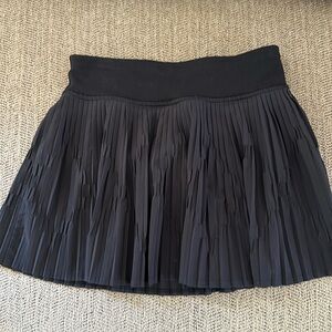 Ivivva by Lululemon pleated black skirt (Size 7)